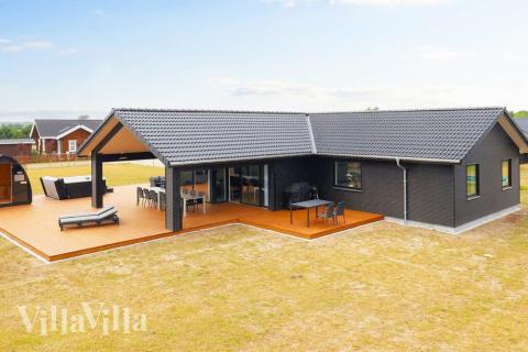 Dieses schöne Poolhaus Nr. 649 mit Platz für 14 Personen liegt in Lolland/Falster/Mön