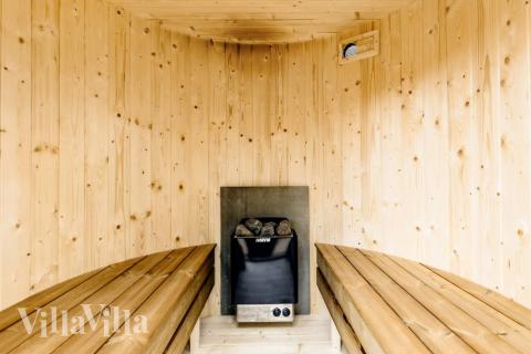 Genießen Sie die heiße Sauna im Luxusferienhaus Nr. 650 für 10 Personen