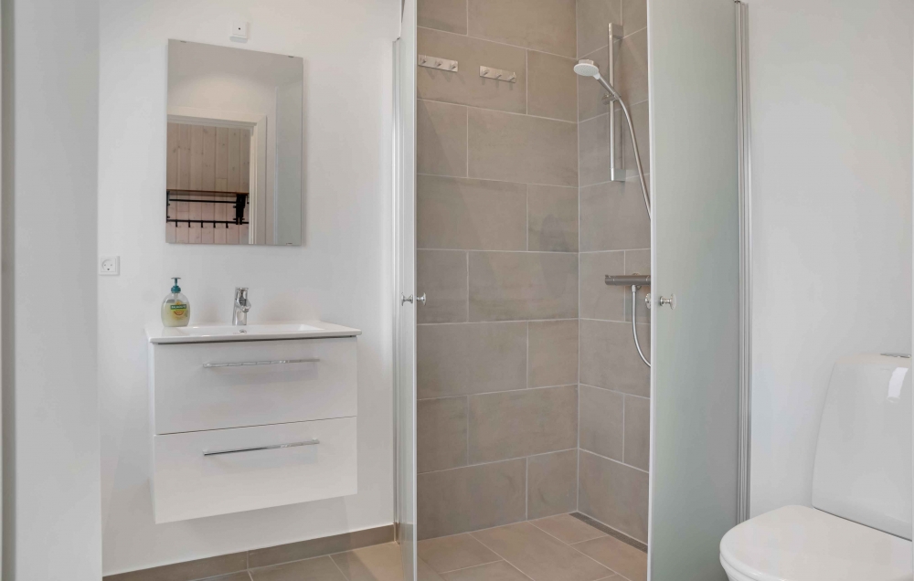Eines der Badezimmer im Luxusferienhaus Nr. 661
