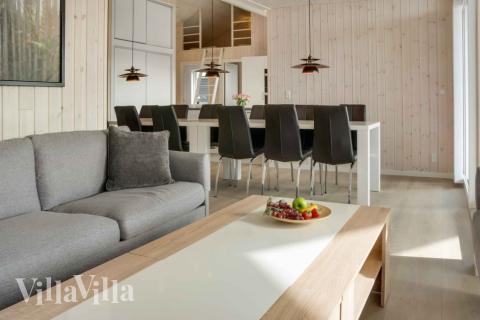 Die Couch im Luxusferienhaus Nr. 661 in Lolland/Falster/Mön lädt zu Gesellschaftsspielen oder zu Kinoabenden ein.