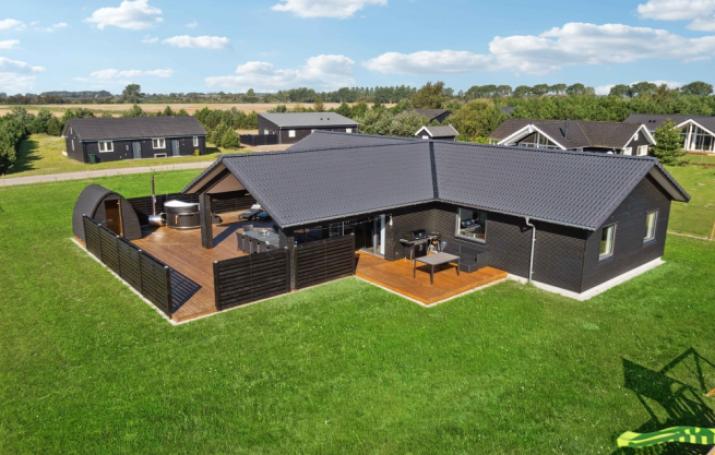 Dieses schöne Poolhaus Nr. 661 mit Platz für 14 Personen liegt in Lolland/Falster/Mön