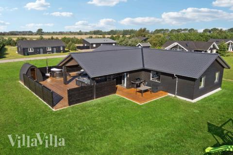 Dieses schöne Poolhaus Nr. 661 mit Platz für 14 Personen liegt in Lolland/Falster/Mön