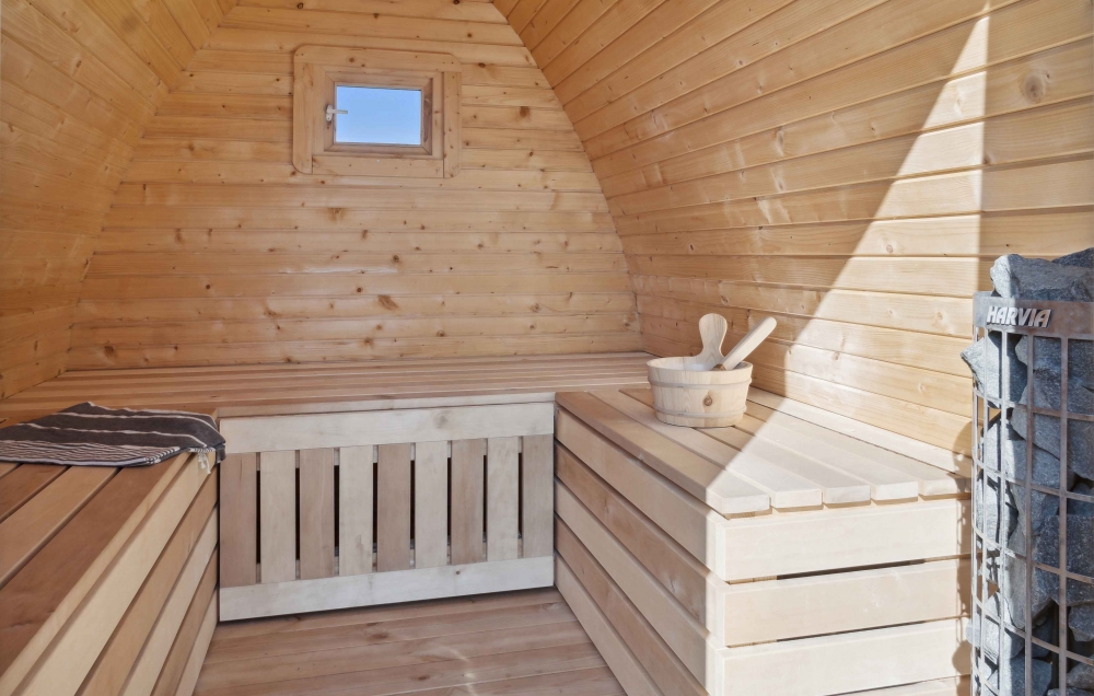 Genießen Sie die heiße Sauna im Luxusferienhaus Nr. 661 für 14 Personen