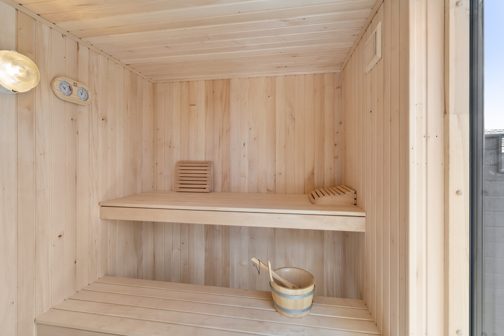 Genießen Sie die heiße Sauna im Luxusferienhaus Nr. 663 für 18 Personen