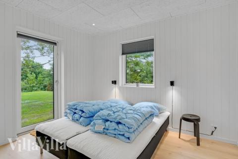 Eines der 8 Schlafzimmer im Luxusferienhaus Nr. 674
