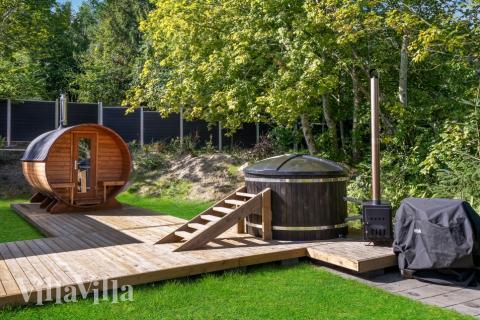 Das Luxusferienhaus Nr. 674 hat eine tolle Terrasse, die mit hochwertigen Gartenmöbeln für 26 Personen ausgestattet ist.