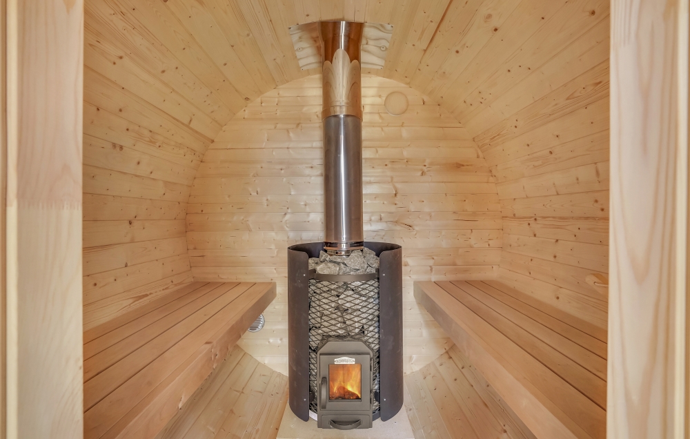 Genießen Sie die heiße Sauna im Luxusferienhaus Nr. 674 für 26 Personen