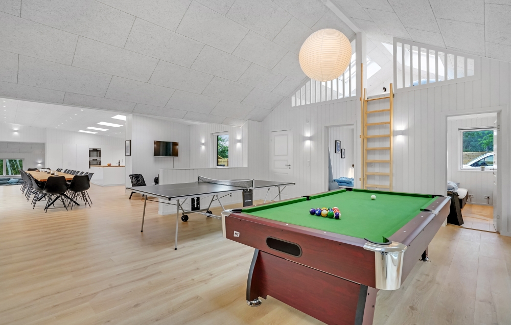Neben den vielen schönen Stunden, die man im Poolbereich des Hauses verbringen kann, bietet das Luxusferienhaus 674 auch Spielevergnügen bei Billard/Tischtennis und Darts