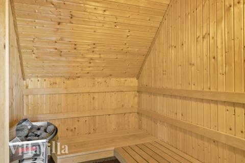 Genießen Sie die heiße Sauna im Luxusferienhaus Nr. 675 für 15 Personen