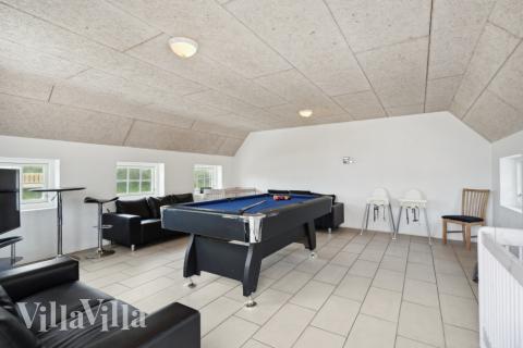 Neben den vielen schönen Stunden, die man im Poolbereich des Hauses verbringen kann, bietet das Luxusferienhaus 678 auch Spielevergnügen bei Billard/Tischtennis und Darts