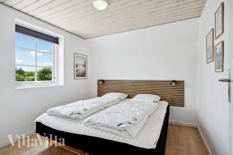 Eines der 7 Schlafzimmer im Luxusferienhaus Nr. 678