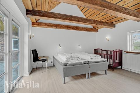 Eines der 9 Schlafzimmer im Luxusferienhaus Nr. 679