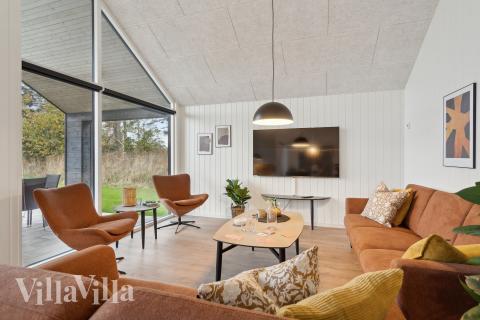 Die Couchecke im Luxusferienhaus Nr. 647 in Fünen und seine Inseln.