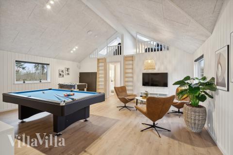 Neben den vielen schönen Stunden, die man im Poolbereich des Hauses verbringen kann, bietet das Luxusferienhaus 647 auch Spielevergnügen bei Billard/Tischtennis und Darts