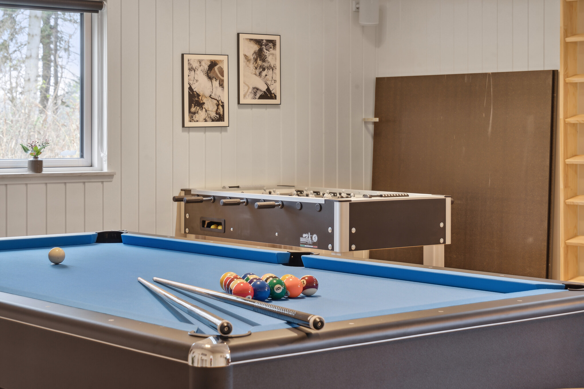 Das Luxusferienhaus 647 für 14 Personen hat einen großen Aktivitätsraum mit u. a. Billard und Darts