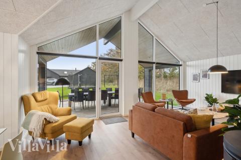 Die Couch im Luxusferienhaus Nr. 647 in Fünen und seine Inseln lädt zu Gesellschaftsspielen oder zu Kinoabenden ein.