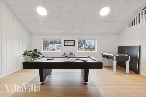 Neben den vielen schönen Stunden, die man im Poolbereich des Hauses verbringen kann, bietet das Luxusferienhaus 630 auch Spielevergnügen bei Billard/Tischtennis und Darts