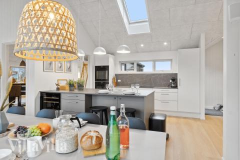 Der Aufenthaltsraum bietet Platz für 16 Personen, wenn ihr das Ferienhaus 630 in Fünen und seine Inseln besucht.