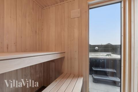 Genießen Sie die heiße Sauna im Luxusferienhaus Nr. 630 für 16 Personen