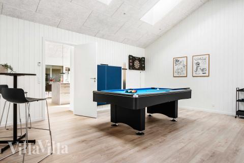 Neben den vielen schönen Stunden, die man im Poolbereich des Hauses verbringen kann, bietet das Luxusferienhaus 682 auch Spielevergnügen bei Billard/Tischtennis und Darts
