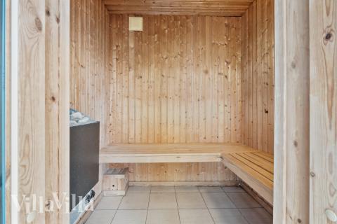 Genießen Sie die heiße Sauna im Luxusferienhaus Nr. 220 für 20 Personen