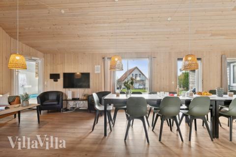 Aufenthaltsraum mit Platz für 20 im Luxusferienhaus Nr. 220.