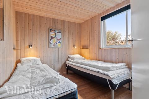 Eines der 8 Schlafzimmer im Luxusferienhaus Nr. 220