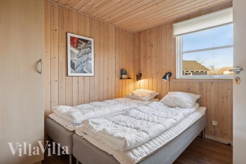 Eines der 6 Schlafzimmer im Luxusferienhaus Nr. 221