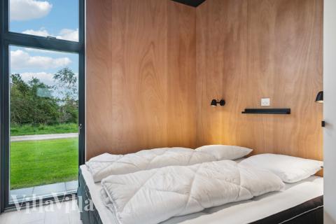 Eines der 7 Schlafzimmer im Luxusferienhaus Nr. 684