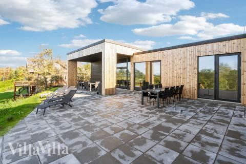 Genießen Sie einen Grillabend auf der Terrasse des Luxusferienhauses Nr. 684 in Limfjord