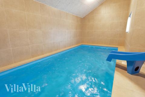 Das Ferienhaus 662 hat einen schicken Poolbereich mit Wasserrutsche, einem geräumigen, eingelassenen Whirlpool und einer Sauna.