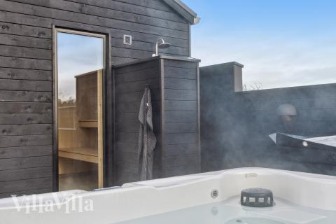 Genießen Sie den warmen Whirlpool im Luxusferienhaus Nr. 652 in Nordjütland