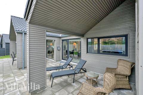 Genießen Sie einen Grillabend auf der Terrasse des Luxusferienhauses Nr. 770 in Deutschland