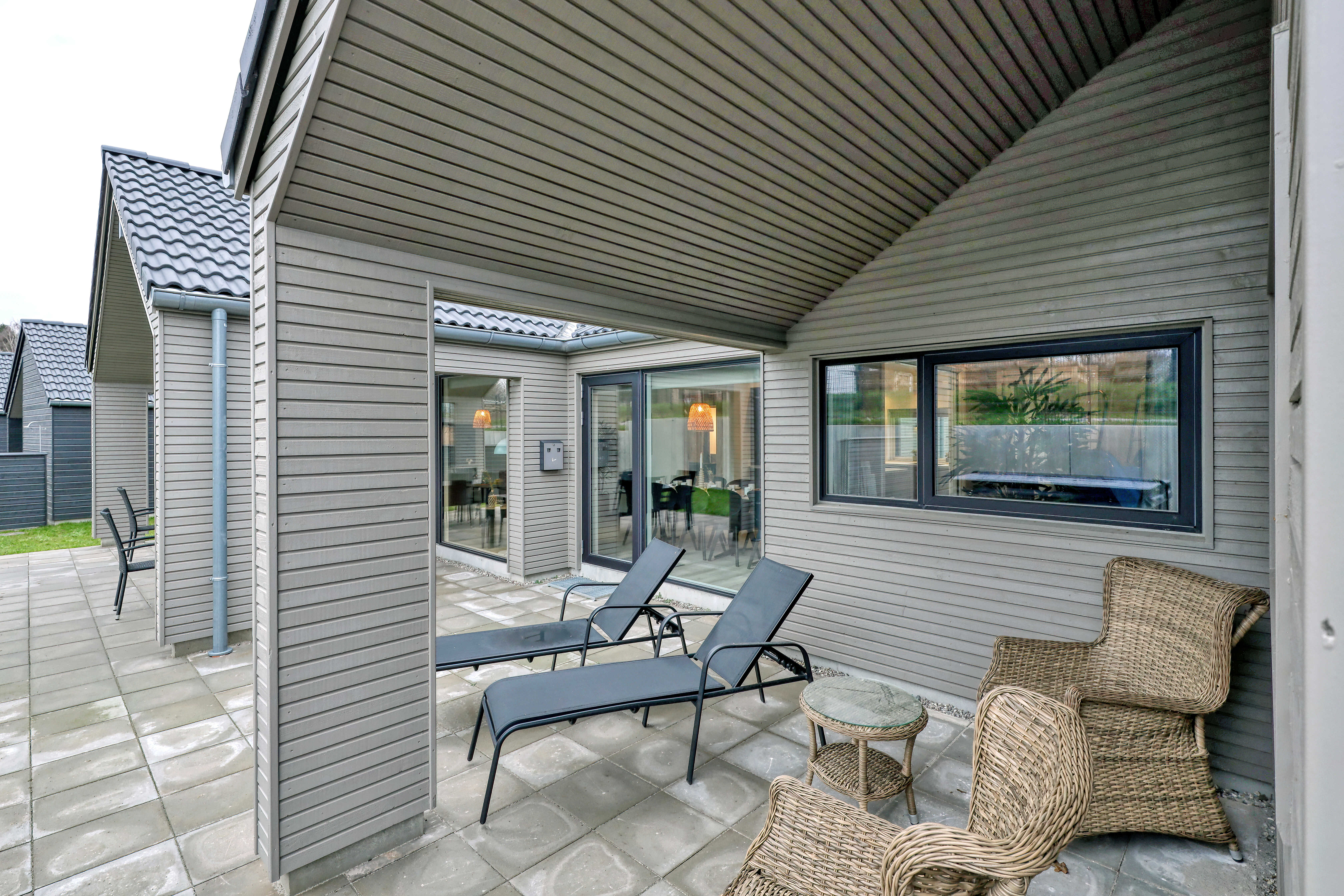 Genießen Sie einen Grillabend auf der Terrasse des Luxusferienhauses Nr. 770 in Deutschland