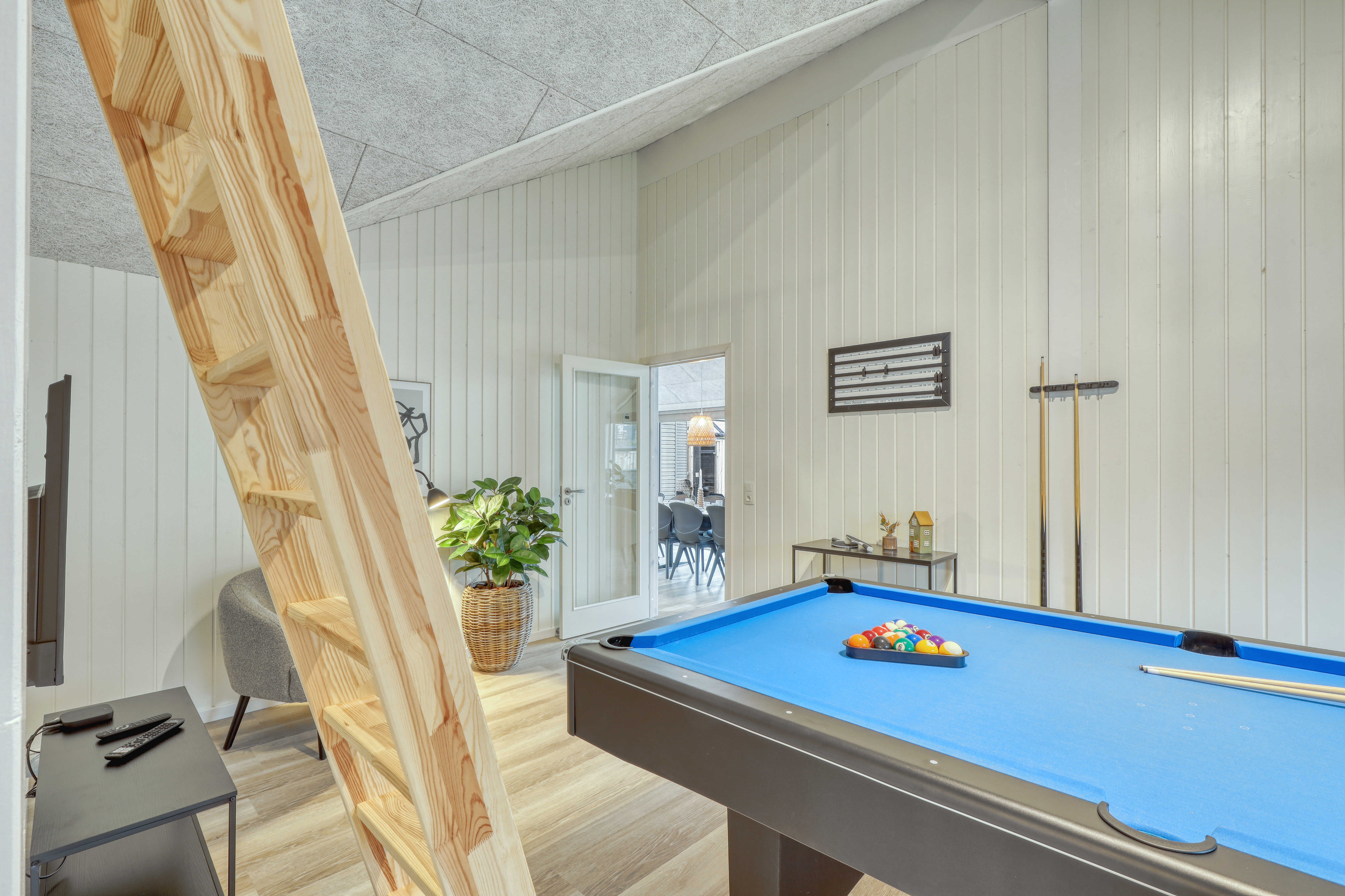 Das Luxusferienhaus 769 für 14 Personen hat einen großen Aktivitätsraum mit u. a. Billard und Darts