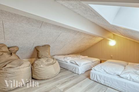 Einige der 14 Schlafgelegenheiten befinden sich im Luxusferienhaus Nr. 769 auf dem ausgebauten Dachboden