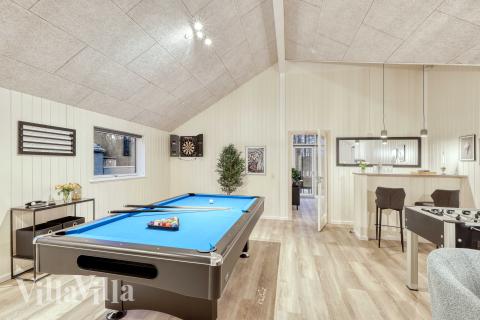 Neben den vielen schönen Stunden, die man im Poolbereich des Hauses verbringen kann, bietet das Luxusferienhaus 762 auch Spielevergnügen bei Billard/Tischtennis und Darts