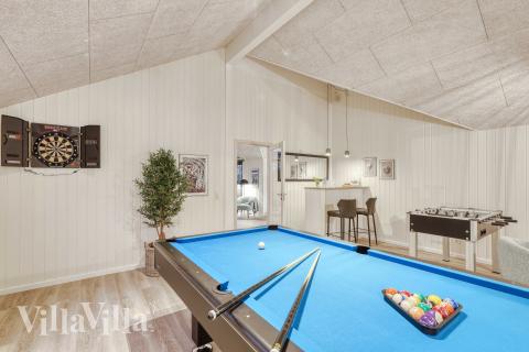 Neben den vielen schönen Stunden, die man im Poolbereich des Hauses verbringen kann, bietet das Luxusferienhaus 763 auch Spielevergnügen bei Billard/Tischtennis und Darts