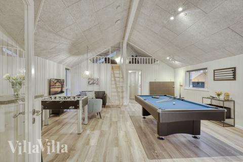 Das Luxusferienhaus 763 für 16 Personen hat einen großen Aktivitätsraum mit u. a. Billard und Darts