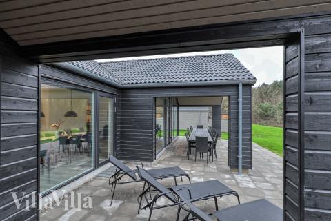 Genießen Sie einen Grillabend auf der Terrasse des Luxusferienhauses Nr. 763 in Deutschland