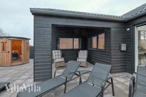 Genießen Sie einen Grillabend auf der Terrasse des Luxusferienhauses Nr. 764 in Deutschland