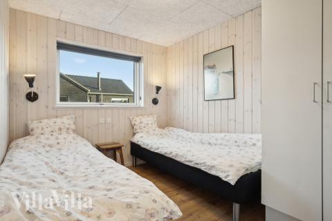 Eines der 7 Schlafzimmer im Luxusferienhaus Nr. 597