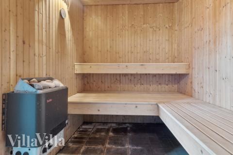 Genießen Sie die heiße Sauna im Luxusferienhaus Nr. 681 für 17 Personen