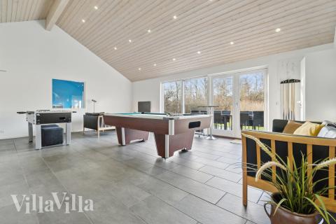 Aktivitätsraum im Luxusferienhaus Nr. 681 mit 6 Schlafzimmern und Platz für 17 Gäste.