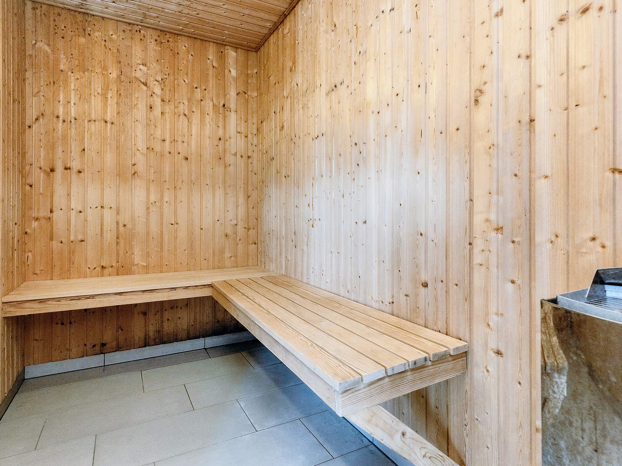 Genießen Sie die heiße Sauna im Luxusferienhaus Nr. 218 für 18 Personen