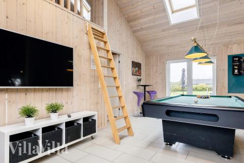 Neben den vielen schönen Stunden, die man im Poolbereich des Hauses verbringen kann, bietet das Luxusferienhaus 218 auch Spielevergnügen bei Billard/Tischtennis und Darts