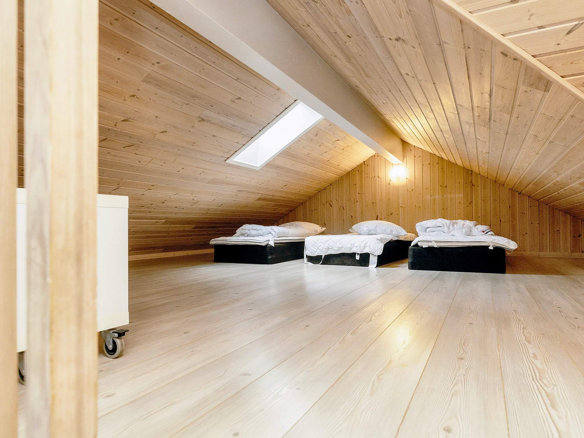 Einige der 18 Schlafgelegenheiten befinden sich im Luxusferienhaus Nr. 218 auf dem ausgebauten Dachboden