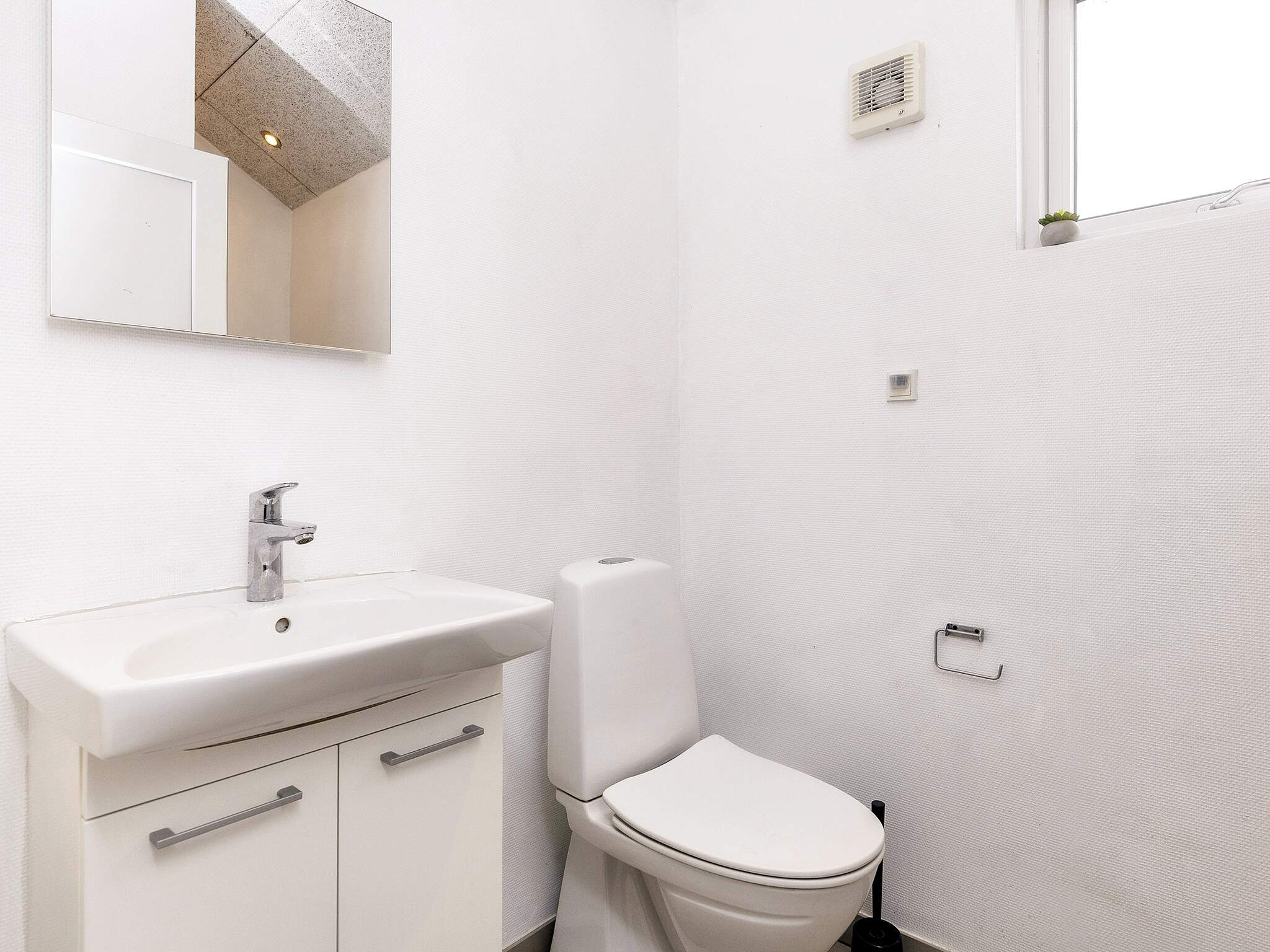 Eines der Badezimmer im Luxusferienhaus Nr. 218