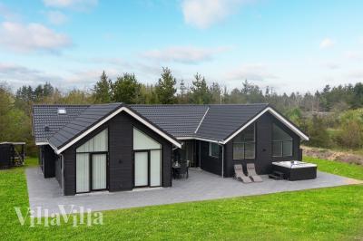 Dieses schöne Poolhaus Nr. 692 mit Platz für 12 Personen liegt in Nordjütland