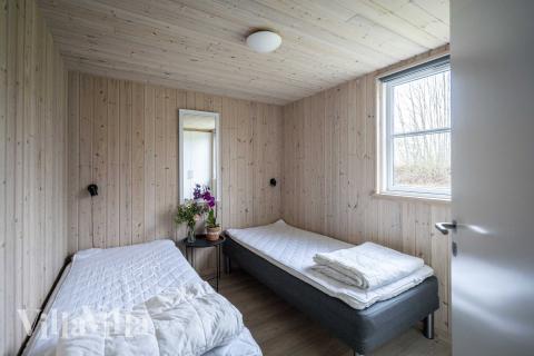 Eines der 7 Schlafzimmer im Luxusferienhaus Nr. 275